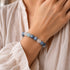 Beaded crystal bracelet with blue and aqua round stones, clear accents, stretch fit