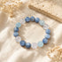 Beaded crystal bracelet featuring blue, aqua, and clear round stones, stretch bracelet