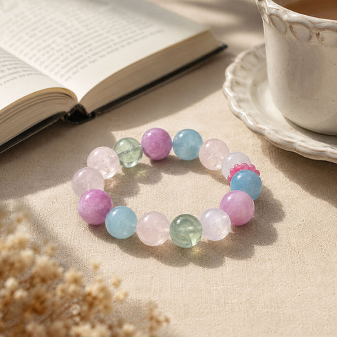 Gemstone bead bracelet with pastel round beads in pink, blue, and green tones