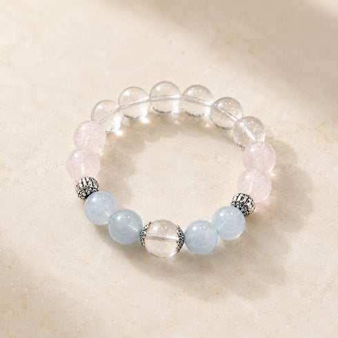 Rose quartz and aquamarine bead bracelet with clear crystal center bead