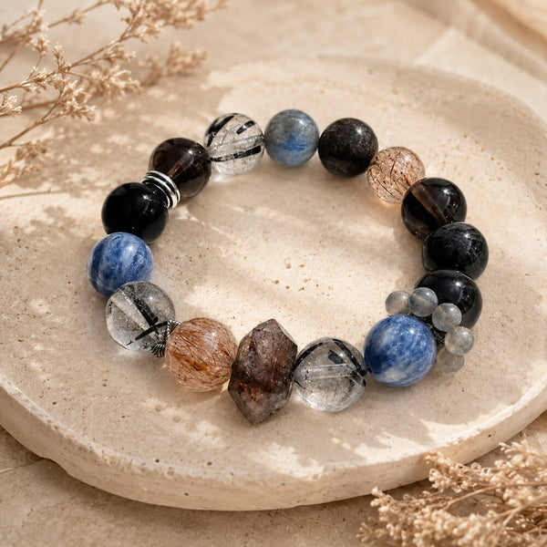 Black beaded crystal bracelet with blue kyanite and dark obsidian stones