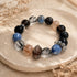 Black beaded crystal bracelet with blue kyanite and dark obsidian stones