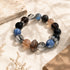 Black and blue crystal bead bracelet with mixed clear and brown stones