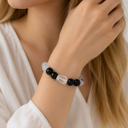 Beaded gemstone bracelet with clear and black round beads