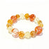 Citrine crystal beaded bracelet with orange, yellow, and clear round stones
