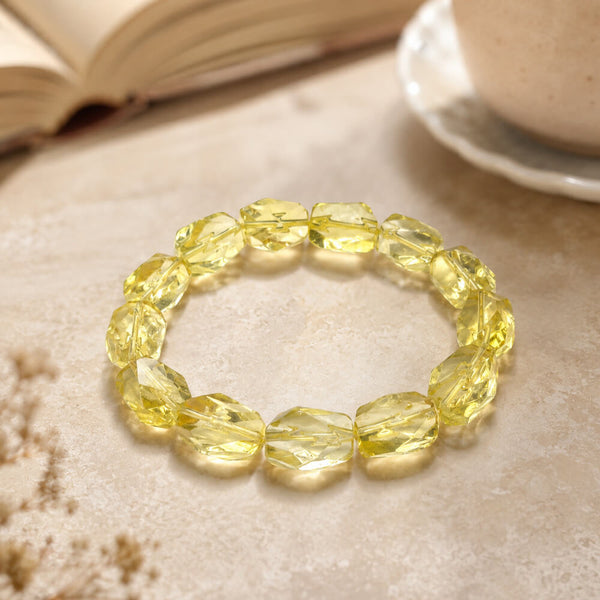 Citrine crystal bracelet with oval faceted yellow stones, elastic band