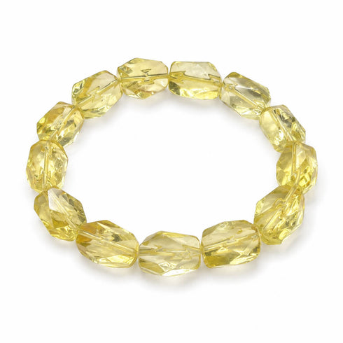 Citrine crystal bracelet featuring oval faceted yellow stones, circular elastic design
