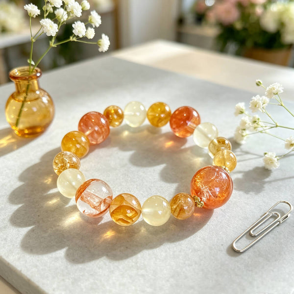 Citrine crystal beaded bracelet with orange, yellow, and clear stones in a circle