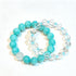 Turquoise and clear crystal bead bracelets with round turquoise stones and clear links