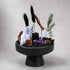 Crystal money tree ornament on black pedestal with blue crystal slabs and black stone accents