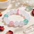 Crystal beaded bracelet with pale pink, mint green, and clear round beads