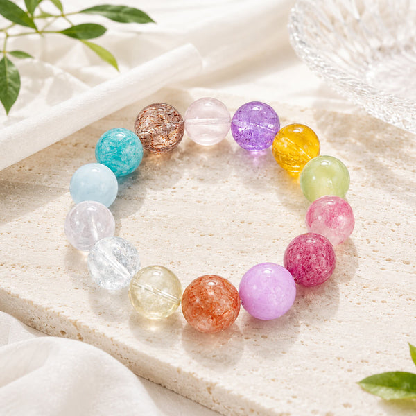 Crystal beaded bracelet, round multicolor gems on light stone display