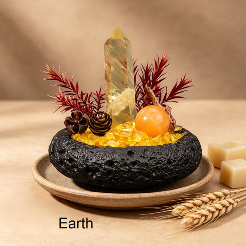 Earth intention crystal garden set with yellow crystal tower in dark stone bowl