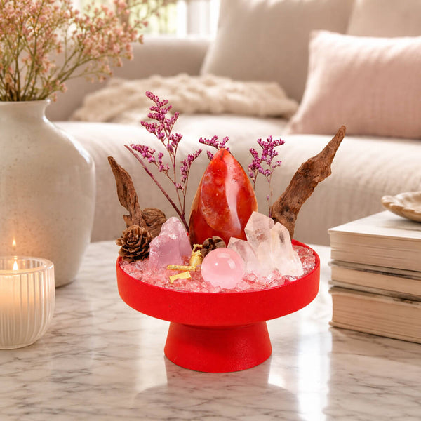 Red crystal garden centerpiece with pink mini flowers, rose quartz, and red agate crystal