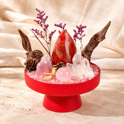 Red crystal garden kit centerpiece with brown wood stems, pink quartz stones, and red agate