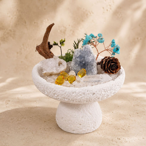White pedestal crystal tree decor with turquoise bird-like branches, gray crystal, amber nuggets, pinecone