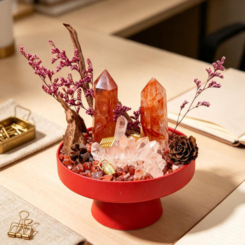 Red crystal garden kit centerpiece with orange crystal points, pink sprigs, and pinecone accent