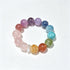 Multi-color crystal bead bracelet with round rose, purple, blue, and green stones