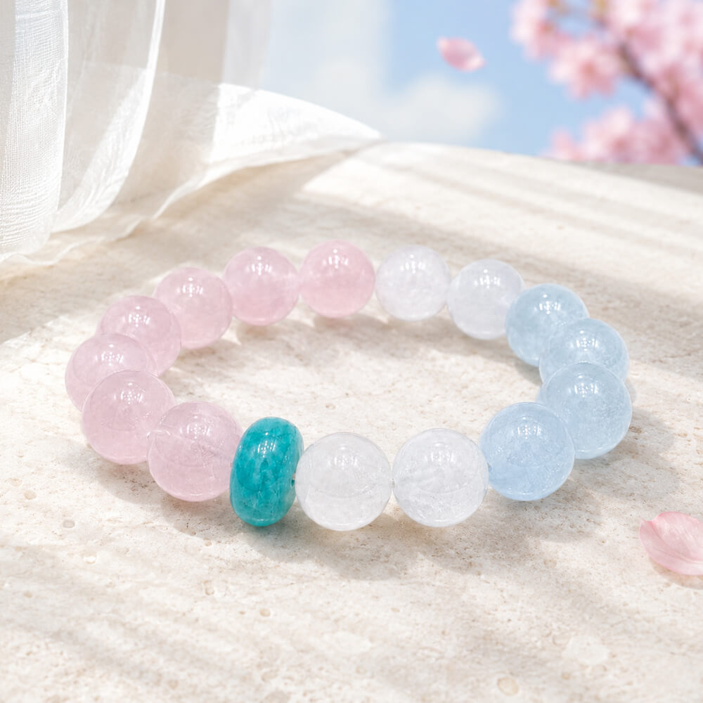 Crystal bead bracelet with pink, white, light blue round beads and turquoise oval accent
