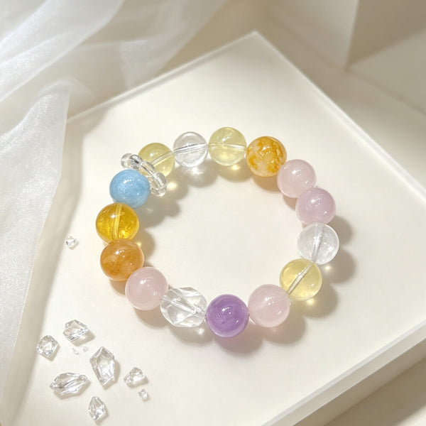 Beaded crystal bracelet with yellow, blue, pink, clear, and purple round stones
