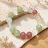 Natural crystal beaded bracelet with green, clear, pink and lemon yellow round stones