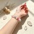Beaded crystal bracelet with pastel pink, blue, and clear stones