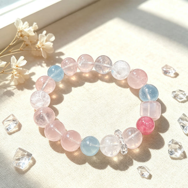 Pastel crystal bead bracelet with pink and blue beads and clear faceted accents