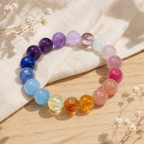 Rainbow beaded crystal bracelet with mixed purple, blue, pink, and amber stones