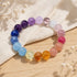 Rainbow beaded crystal bracelet with mixed purple, blue, pink, and amber stones