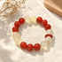 Red and pale yellow crystal bracelet with round beads and elastic fit