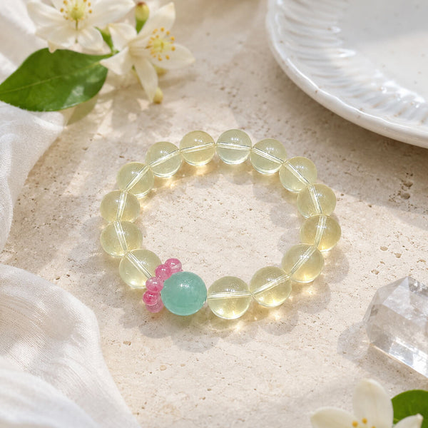 Yellow crystal bracelet with mint and pink detail beads, round beaded circle
