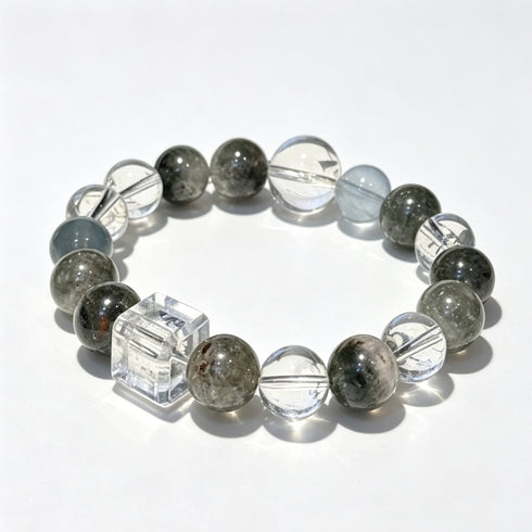 Crystal bead bracelet with green phantom quartz rounds and clear faceted cube accents