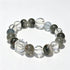 Crystal bead bracelet with green phantom quartz rounds and clear faceted cube accents