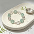 Women’s crystal beaded bracelet with clear and light aqua faceted stones
