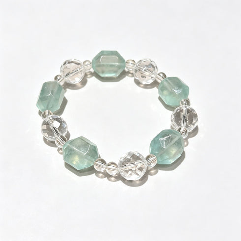 Crystal beaded bracelet with alternating clear and light aqua faceted beads