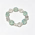 Crystal beaded bracelet with alternating clear and light aqua faceted beads