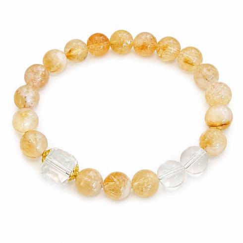Gold and clear crystal beaded bracelet with round beads and clear faceted cube centerpiece
